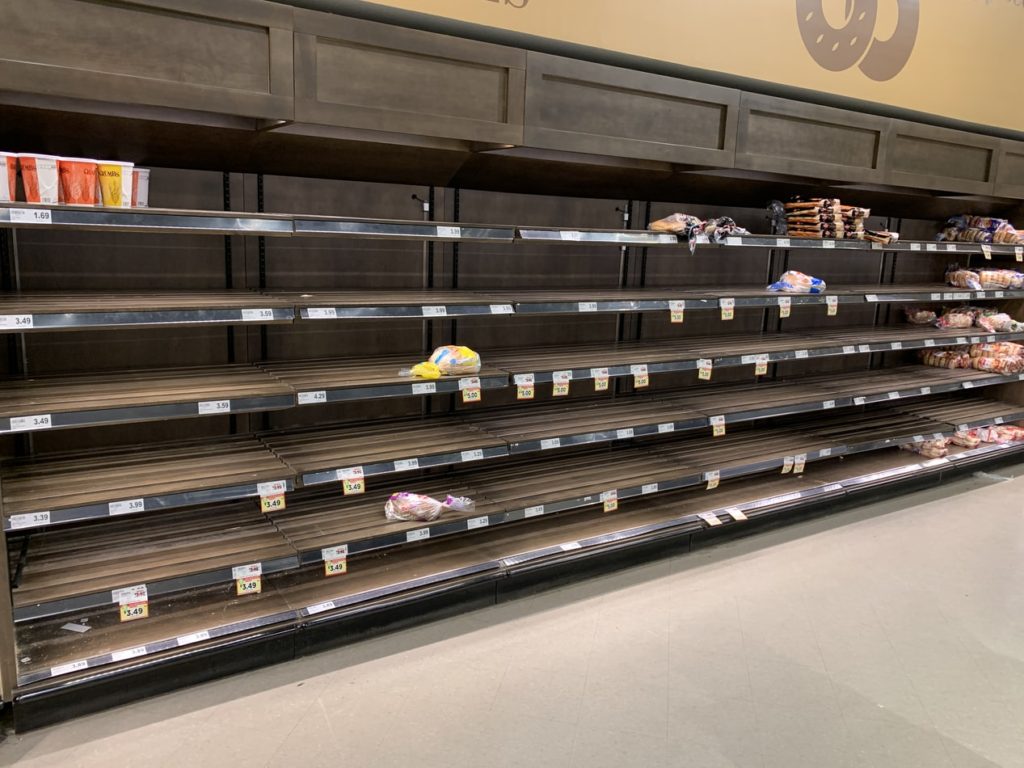 grocery store shelves emptied during the pandemic
