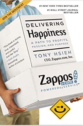 Book cover titled Delivering Happiness by Tony Hsieh, pronounced Shay.
